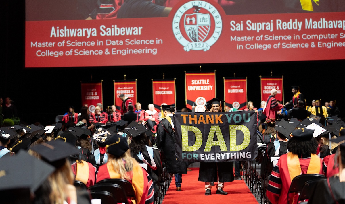 Dad banner unfurled by student