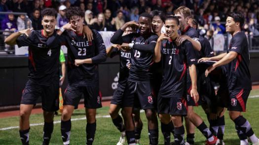 men's soccer on the field following thrilling win